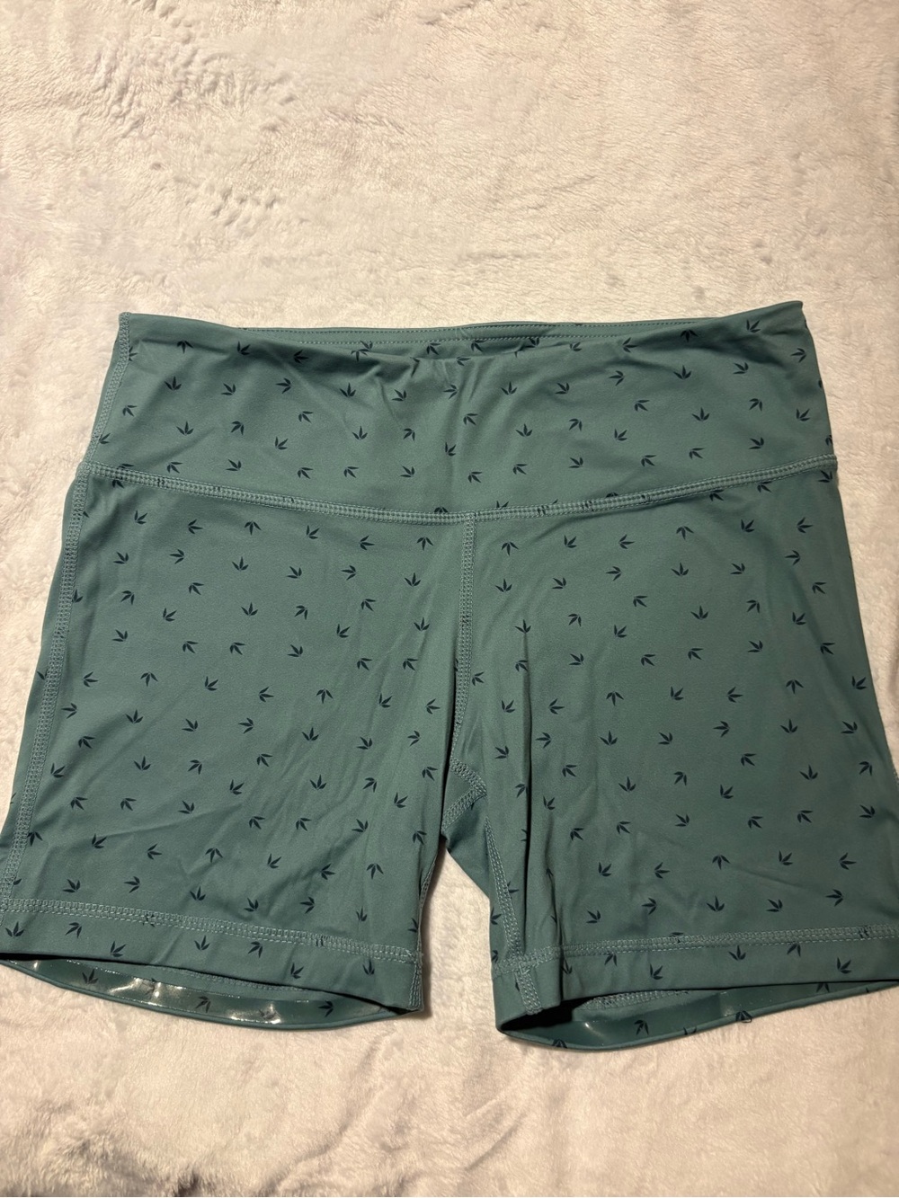 IAB Mid-Rise Bike Shorts in Teal with Subtle Arrow Print - size 6/Small